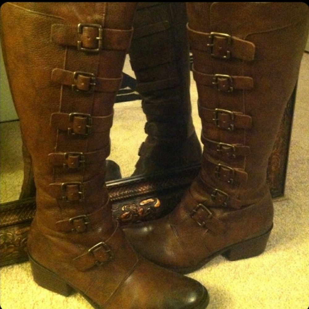 Coffee/ Brown colored boots.